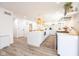 Bright and spacious kitchen featuring island seating, modern appliances, and an open layout for easy living at 3165 Hazel Foster W Ct, Carmel, IN 46033