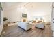 Bright living room with vaulted ceiling, fireplace, and modern furnishings for comfortable living at 3165 Hazel Foster W Ct, Carmel, IN 46033