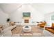 Bright living room with a fireplace, plush sofas, and stylish decor at 3165 Hazel Foster W Ct, Carmel, IN 46033