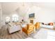 Open-concept living room featuring modern furnishings, a fireplace, and abundant light for comfortable living at 3165 Hazel Foster W Ct, Carmel, IN 46033