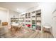 Playroom features open shelving, a -sized table and chairs, and ample storage for toys at 3165 Hazel Foster W Ct, Carmel, IN 46033