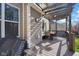 A beautiful back deck with a wood pergola above a table and chairs at 4285 Nottinghill Dr, Avon, IN 46123