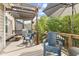 This spacious deck includes a pergola, patio umbrella and outdoor seating at 4285 Nottinghill Dr, Avon, IN 46123
