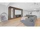 Basement Gathering room with projector screen, comfortable seating, and space for recreational activities at 4285 Nottinghill Dr, Avon, IN 46123