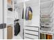 Organized walk-in closet with shelving, drawers, and hanging space to maximize storage at 4285 Nottinghill Dr, Avon, IN 46123