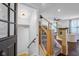 Inviting entryway features a staircase with wood and metal railing and flows into the spacious living area at 4285 Nottinghill Dr, Avon, IN 46123