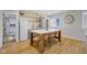 Stylish kitchen with a large island and breakfast bar with a view of the connecting bathroom at 4285 Nottinghill Dr, Avon, IN 46123