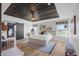 Bright primary bedroom with dark wood plank ceiling, and decorative accents at 4285 Nottinghill Dr, Avon, IN 46123