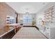 Bright playroom with modern decor, large rug and lots of natural light at 4285 Nottinghill Dr, Avon, IN 46123