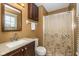 Cozy bathroom features an updated vanity, mirror, and shower at 470 Waterford Dr, Zionsville, IN 46077