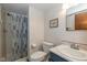Bathroom with shower, toilet, sink, and large mirror at 470 Waterford Dr, Zionsville, IN 46077