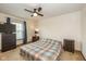 Bedroom features neutral walls, a ceiling fan, and a window with natural light at 470 Waterford Dr, Zionsville, IN 46077