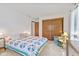 Inviting bedroom with a full-sized bed, ample closet space, and carpet flooring that promotes a cozy atmosphere at 5132 W Blue Bell Dr, New Palestine, IN 46163