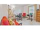 Bedroom with a gray carpet, window, desk, chair, couch and easel at 5132 W Blue Bell Dr, New Palestine, IN 46163