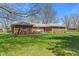 Well-maintained home with a beautiful lawn, decorative landscaping, and classic brickwork at 5132 W Blue Bell Dr, New Palestine, IN 46163