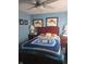 Comfortable bedroom with a queen-sized bed, stylish bedding, and matching nightstands at 5338 Traditions Dr, Indianapolis, IN 46235