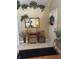 Inviting entryway with a mirror, decorative accents, and stylish flooring at 5338 Traditions Dr, Indianapolis, IN 46235