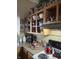 Well-equipped kitchen with wooden cabinets, and modern appliances at 5338 Traditions Dr, Indianapolis, IN 46235