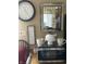 Kitchen area featuring white tea pot and decorated with a wall clock and mirror at 5338 Traditions Dr, Indianapolis, IN 46235