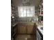 Functional kitchen area with a double sink, and updated fixtures at 5338 Traditions Dr, Indianapolis, IN 46235