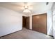 Bright bedroom with a ceiling fan, carpet floors, and a spacious closet at 562 Monte Vista Dr, Greenwood, IN 46143