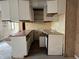 Kitchen featuring retro cabinets, countertop and ample space for customization at 5810 Greenfield Ave, Indianapolis, IN 46219