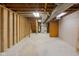 Unfinished basement featuring exposed ceiling and walls ready to be customized to your unique preferences at 5917 Camelback Ct, Indianapolis, IN 46250
