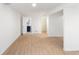 Bright, spacious basement offers light wood flooring, clean white walls, and ample space for versatile use at 5917 Camelback Ct, Indianapolis, IN 46250