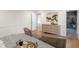 Bedroom featuring hardwood floors, dresser, and an ensuite bathroom with a glass shower at 5917 Camelback Ct, Indianapolis, IN 46250