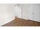 Clean, bright bedroom with hardwood floors and a closet at 5917 Camelback Ct, Indianapolis, IN 46250