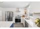 Modern updated kitchen with stainless steel appliances and white cabinetry at 5917 Camelback Ct, Indianapolis, IN 46250