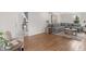 Spacious living area with gleaming hardwood floors and comfortable seating arrangement at 5917 Camelback Ct, Indianapolis, IN 46250
