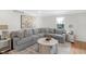 Inviting living room with plush seating, decorative accents, and ample natural light at 5917 Camelback Ct, Indianapolis, IN 46250