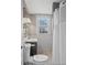 Bright bathroom featuring a window and updated fixtures, offering a clean and modern feel at 601 Wallace Ave, Indianapolis, IN 46201