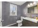 Bathroom featuring modern sink, complemented by the large window allowing for natural light at 601 Wallace Ave, Indianapolis, IN 46201