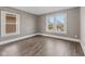 Cozy bedroom showcasing natural light, updated flooring, and inviting neutral paint at 601 Wallace Ave, Indianapolis, IN 46201