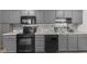 Modern kitchen featuring sleek countertops, appliances, and ample cabinet space at 601 Wallace Ave, Indianapolis, IN 46201