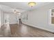 Spacious living room with hardwood floors, ample natural light, and a cozy atmosphere at 601 Wallace Ave, Indianapolis, IN 46201