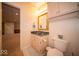 Bathroom featuring a vanity with a marble countertop, a mirror, and a toilet at 6013 Yellow Birch Ct, Avon, IN 46123
