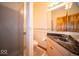 Well-lit bathroom featuring tiled walls, large mirror, and granite countertops at 6013 Yellow Birch Ct, Avon, IN 46123