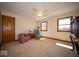 Bedroom featuring carpet, ceiling fan, and two windows to let in natural light at 6013 Yellow Birch Ct, Avon, IN 46123