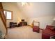 Bonus room with a sloped ceiling, carpet, and a window for natural light at 6013 Yellow Birch Ct, Avon, IN 46123