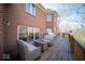 Large deck area featuring outdoor seating, a fire pit, and a grill at 6013 Yellow Birch Ct, Avon, IN 46123