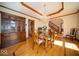 Elegant dining room with hardwood floors, chandelier and built-in cabinet at 6013 Yellow Birch Ct, Avon, IN 46123