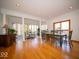 Spacious dining area adjacent to a sunroom, perfect for entertaining and relaxation at 6013 Yellow Birch Ct, Avon, IN 46123