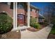 Charming red brick home entrance with meticulously kept landscaping at 6013 Yellow Birch Ct, Avon, IN 46123