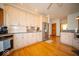 Bright kitchen with light cabinets, granite countertops, and stainless steel refrigerator at 6013 Yellow Birch Ct, Avon, IN 46123
