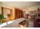 Open living room design with built in wood bookcases and access to dining room at 6013 Yellow Birch Ct, Avon, IN 46123
