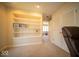 Office with shelving, a window to let in natural light, and a view to the hallway at 6013 Yellow Birch Ct, Avon, IN 46123