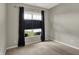 Bedroom with carpet, window, and neutral paint at 6026 Rockdell Dr, Indianapolis, IN 46237